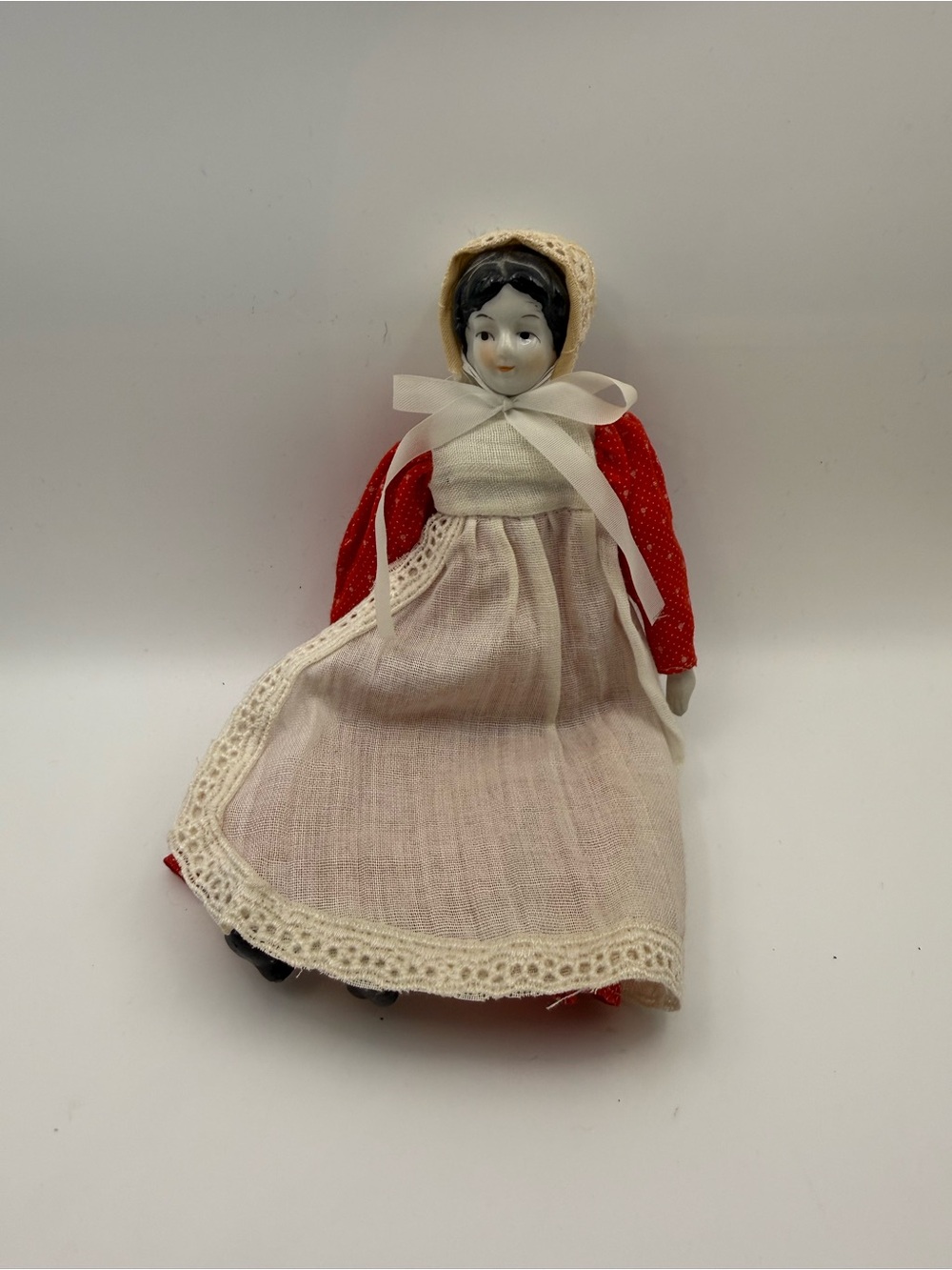 Antique German 7in China Doll With Red Dress And Apron Porcelain Head Hands Feet